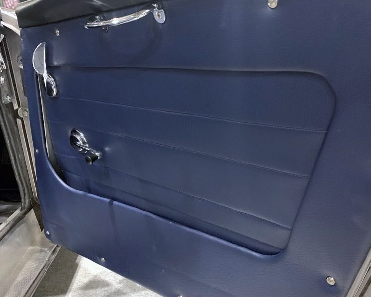 Austin Healey BJ7 trimmed with AH Blue Vinyl Main and Inner Door Panels, LeatherFaced Seats and Dark Blue Karvel Carpet