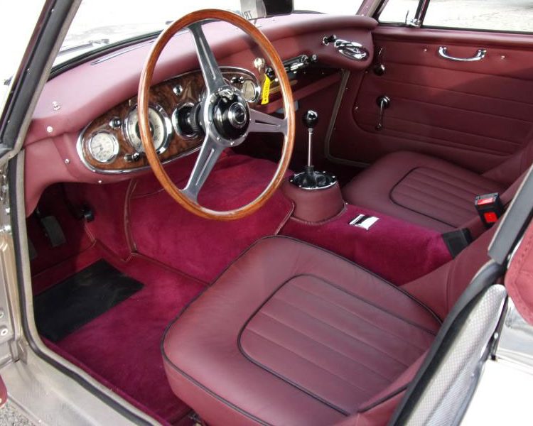 Austin Healey BJ7 trimmed with Maroon Full Leather Panels and Seats with Maroon Wool Carpets