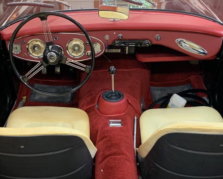Austin Healey BJ7 trimmed with Cherry Red Vinyl Dash Top and Dashboard Facia Panels with Bright Red Nylon Carpet