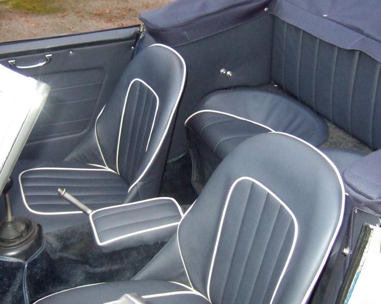 Austin Healey BJ7 trimmed with Dark Blue Full Leather Seats with White Piping and Dark Blue Karvel Carpet