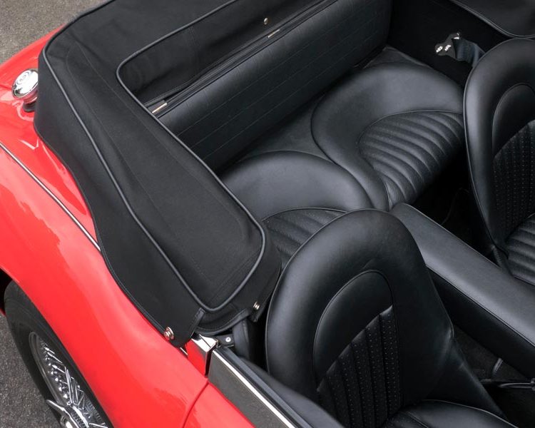 Austin Healey BJ8 trimmed with Black Vinyl Panels and Seats with Black Mohair Hood Frame Cover