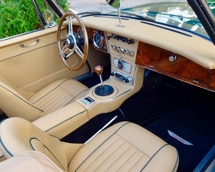 Austin Healey BJ8 trimmed with Biscuit Light Tan Leather Panels and Seats with BRG Piping and Black Wool Carpet
