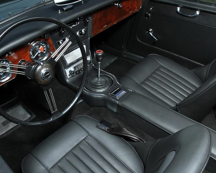 Austin Healey BJ8 trimmed with Black Vinyl Panels, Leather Seats (with Embossed Leather Pleats) and Black Karvel Carpet