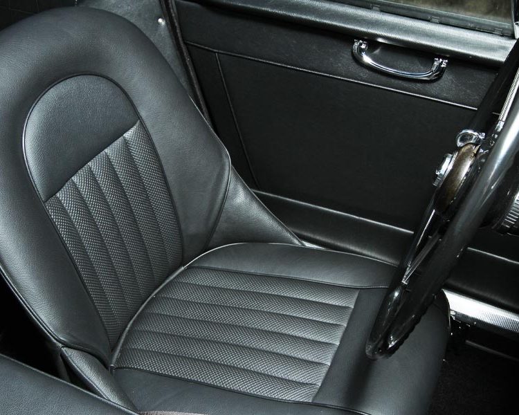 Austin Healey BJ8 trimmed with Black Vinyl Panels, Leather Seats (with Embossed Leather Pleats) and Black Karvel Carpet
