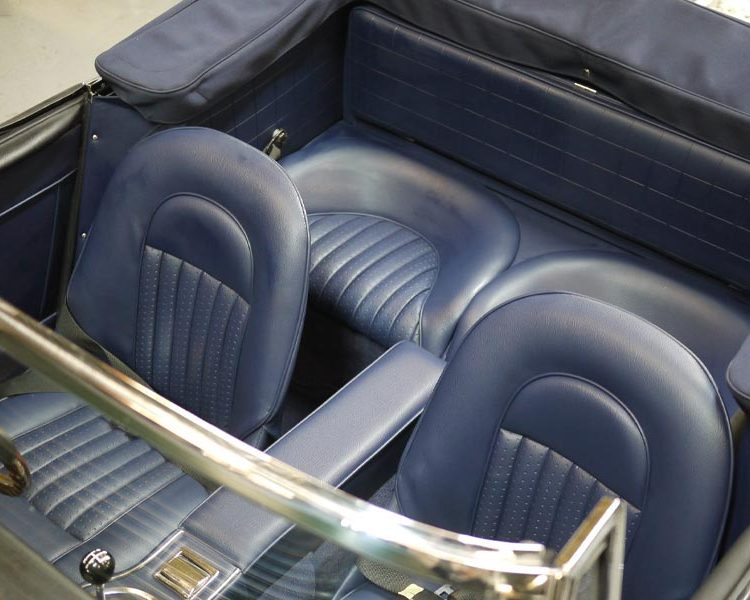 Austin Healey BJ8 trimmed with AH Blue Vinyl Panels, Seats and Centre Cushion Armrest with Dark Blue Karvel Carpet