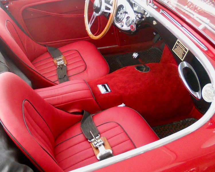 Austin Healey BN2 trimmed with Cherry Red Vinyl Panels and LeatherFaced Seats with Black Piping