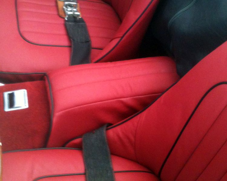 Austin Healey BN2 trimmed with Cherry Red with Black Piping LeatherFaced Seats and Centre Cushion Armrest (Short Style)