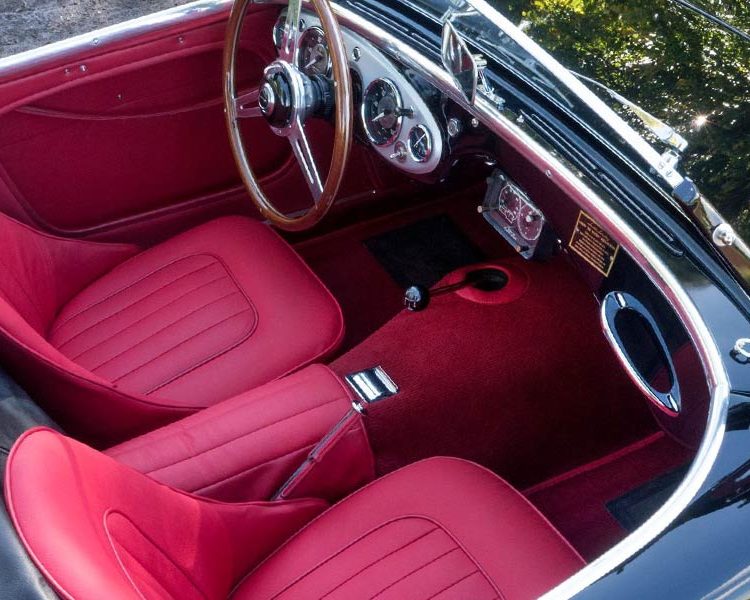 Austin Healey BN2 trimmed with Bright Red Vinyl Panels and LeatherFaced Seats with Bright Red Nylon Carpet