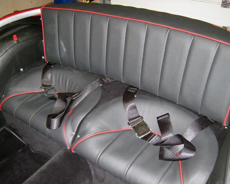Austin Healey BN4 trimmed with Black Vinyl Wheelarch Covers and Black LeatherFaced Rear Seats with Cherry Red Piping