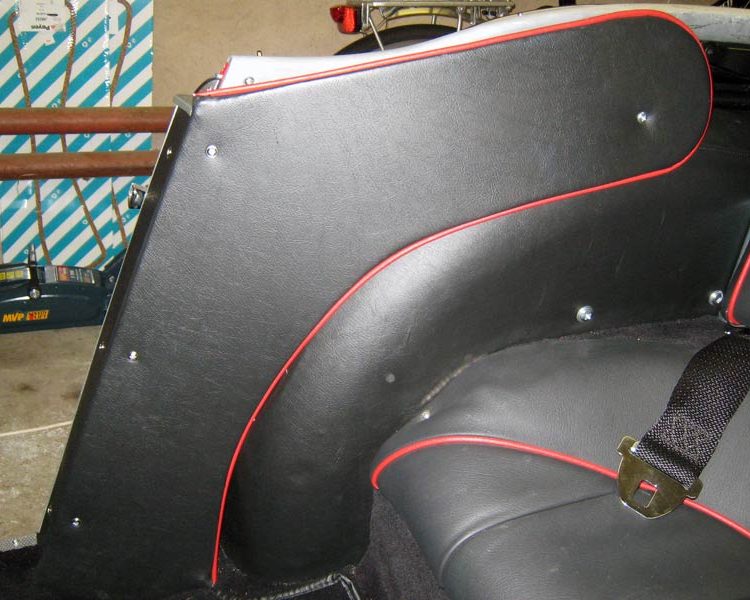 Austin Healey BN4 trimmed with Black Vinyl Quarter Panels and Wheelarch Covers with Cherry Red Piping