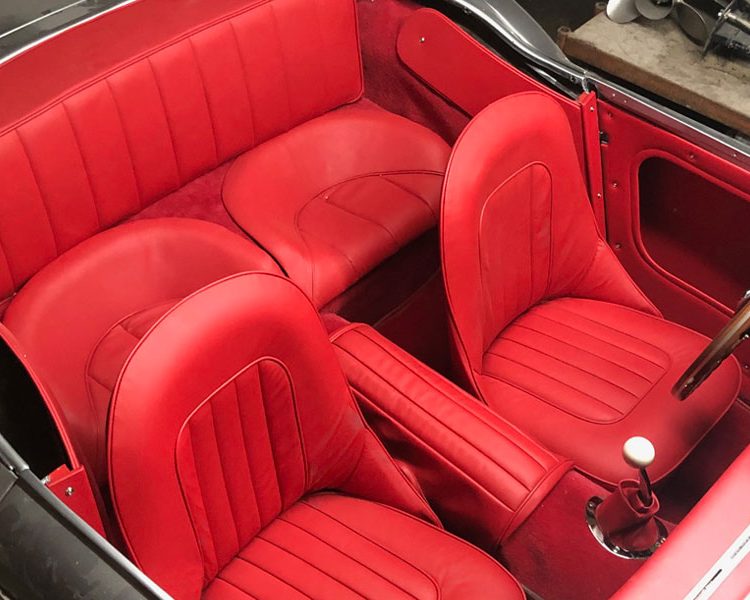 Austin Healey BN4 trimmed with Bright Red Vinyl Panels and LeatherFaced Seats with Bright Red Wool Carpet