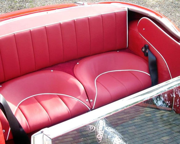 Austin Healey BN4 trimmed with Cherry Red Vinyl Panels, Full Leather Rear Seats with White Piping and Red Wool Carpet
