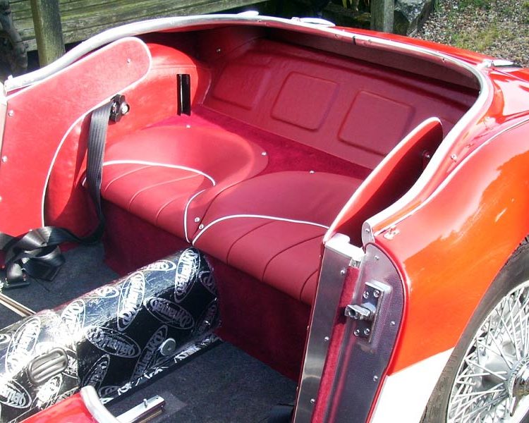 Austin Healey BN4 trimmed with Cherry Red Vinyl Quarter Panels and Rear Bulkhead Area, Full Leather Rear Seats