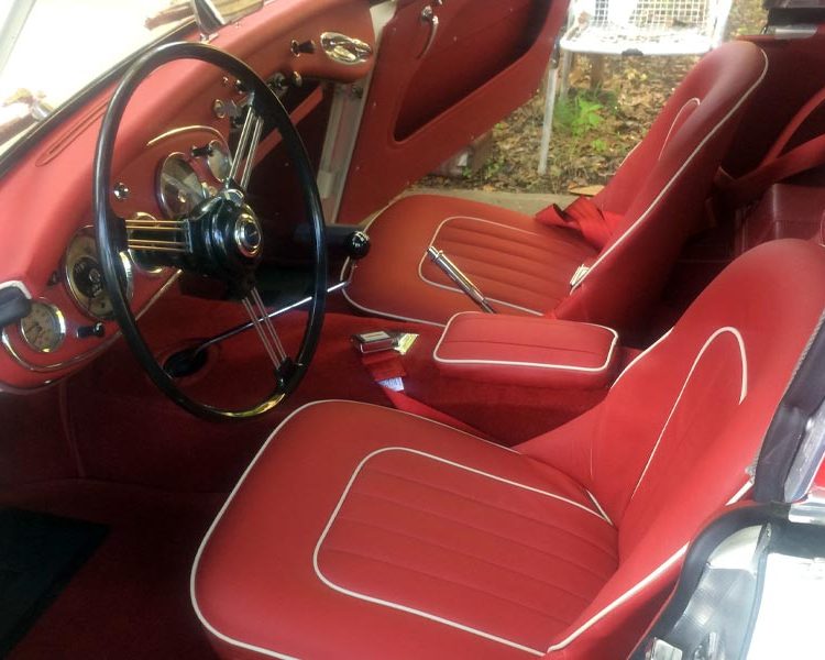 Austin Healey BN7 trimmed with Cherry Red Vinyl Panels and LeatherFaced Seats with White Piping and Bright Red Nylon Carpet