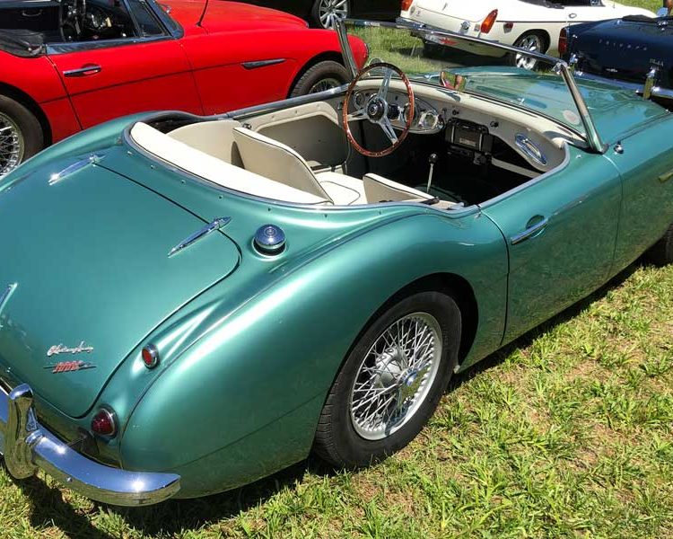 Austin Healey BT7 trimmed with Ivory Vinyl Panels, LeatherFaced Seats with BRG Piping and Dark Green Wool Carpet