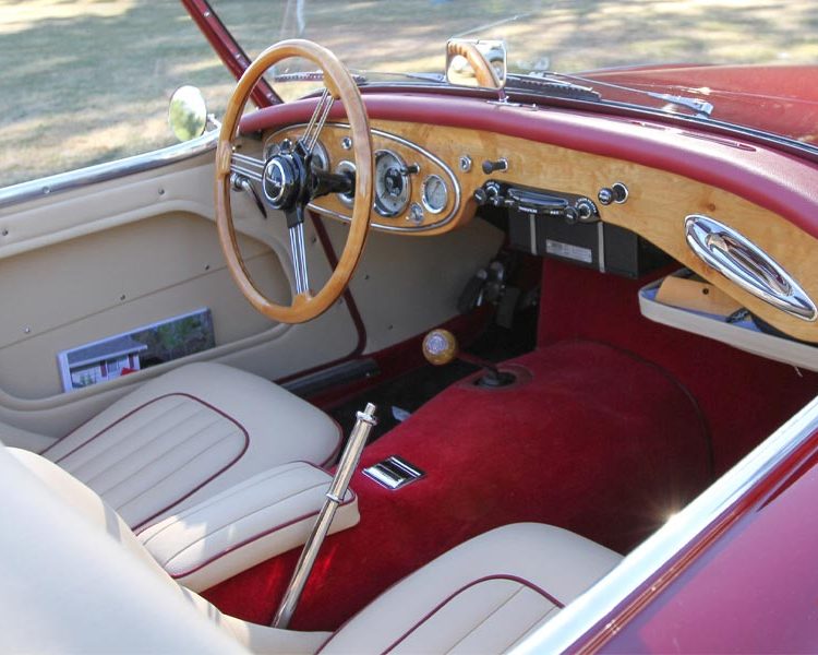 Austin Healey BT7 trimmed with Magnolia Vinyl Panels, LeatherFaced Seats with Matador Red Piping and Red Wool Carpet