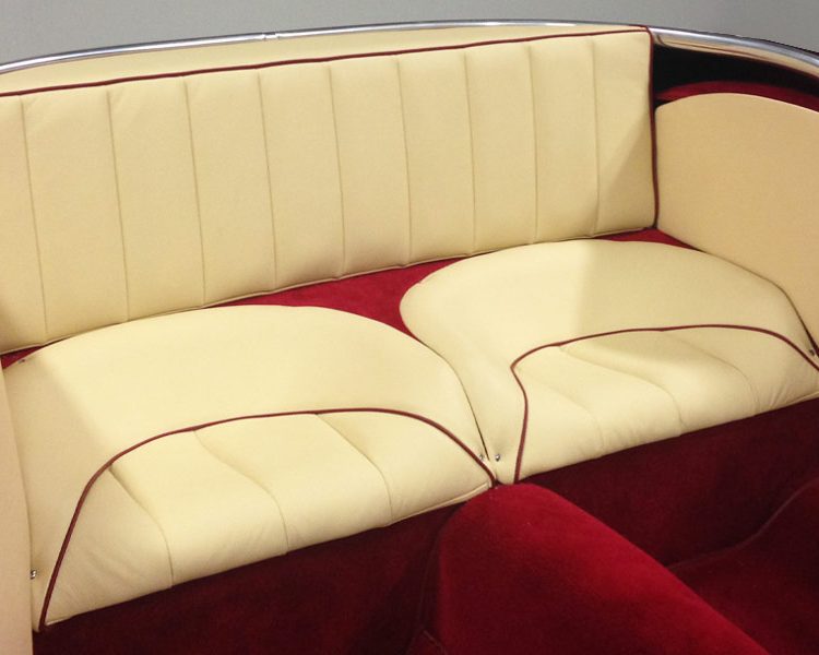 Austin Healey BT7 trimmed with Magnolia Vinyl Panels and LeatherFaced Rear Seats with Matador Red Piping and Red Wool Carpet