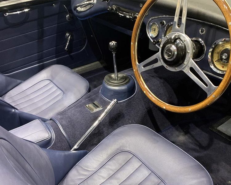 Austin Healey BJ7 trimmed with AH Blue Vinyl Panels, LeatherFaced Seats and Dark Blue Karvel Carpet