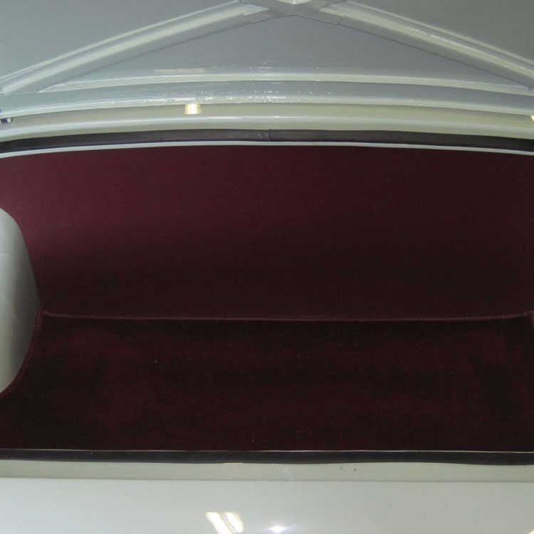 Triumph TR2 fitted with a Maroon Vinyl Trimmed Boot Trunk Liner Board, and Wool Carpet Mat.