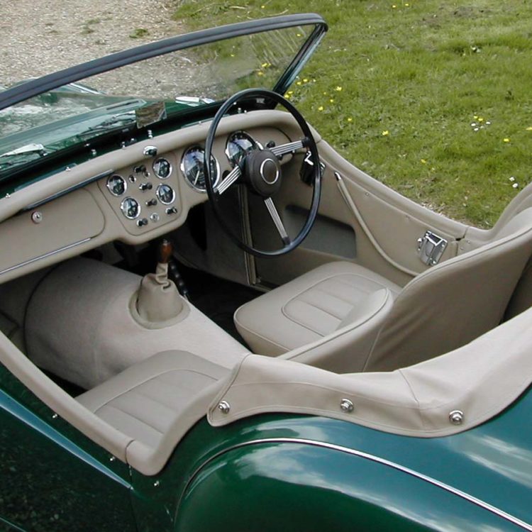 Triumph TR2 fitted with Beige PVC Everflex Hood Frame Cover, LeatherFaced Seat Covers, and Camel Wool Carpets.