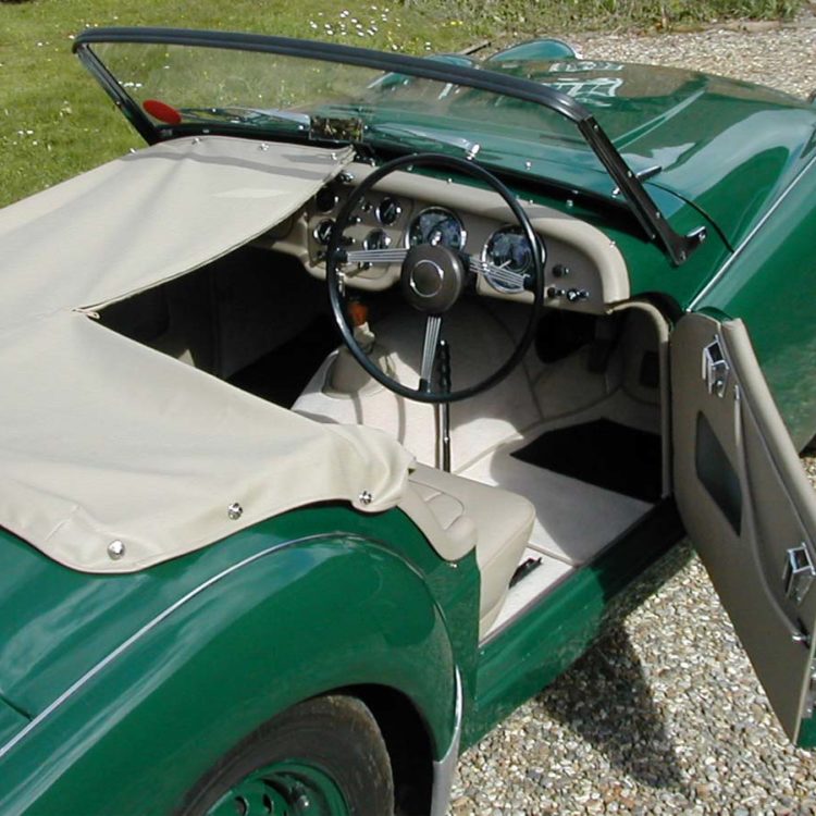 Triumph TR2 fitted with Beige PVC Everflex Tonneau Cover, Vinyl Door Panels, and Camel Wool Carpets.