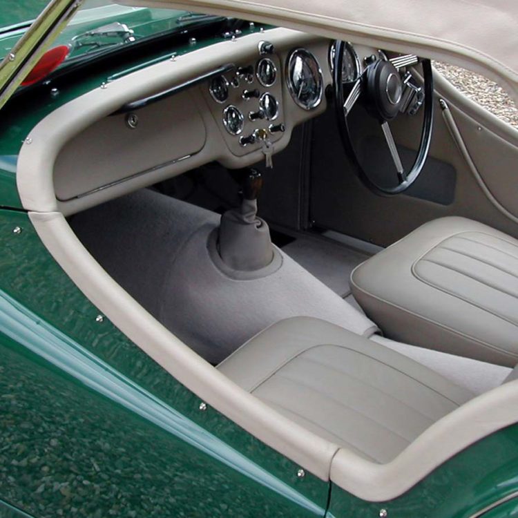 Triumph TR2 fitted with Beige PVC Everflex Soft Top Convertible Hood, Leather Cappings and Camel Wool Carpets.
