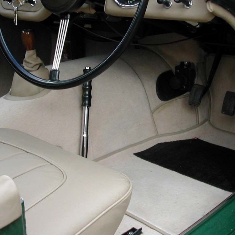 Triumph TR2 fitted with Stone LeatherFaced Front Seats, and Camel Wool Carpets.