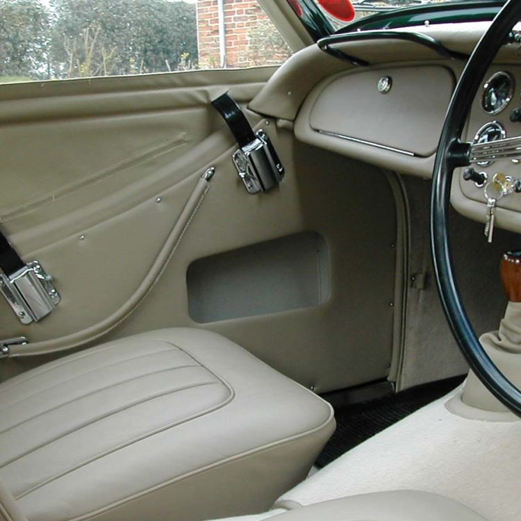 Triumph TR2 fitted with Stone LeatherFaced Front Seats, and Vinyl Door Panels, & Beige PVC Everflex Sidescreen Units.