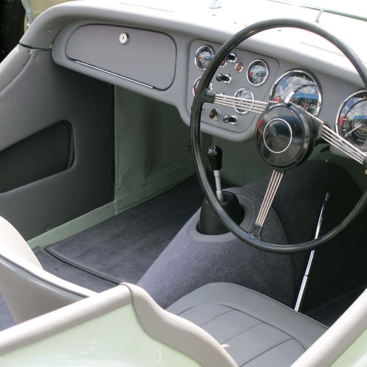 Triumph TR2 fitted with Saville Grey Vinyl Door Trims and Dashboard Facia Panel, and Wool Carpets.