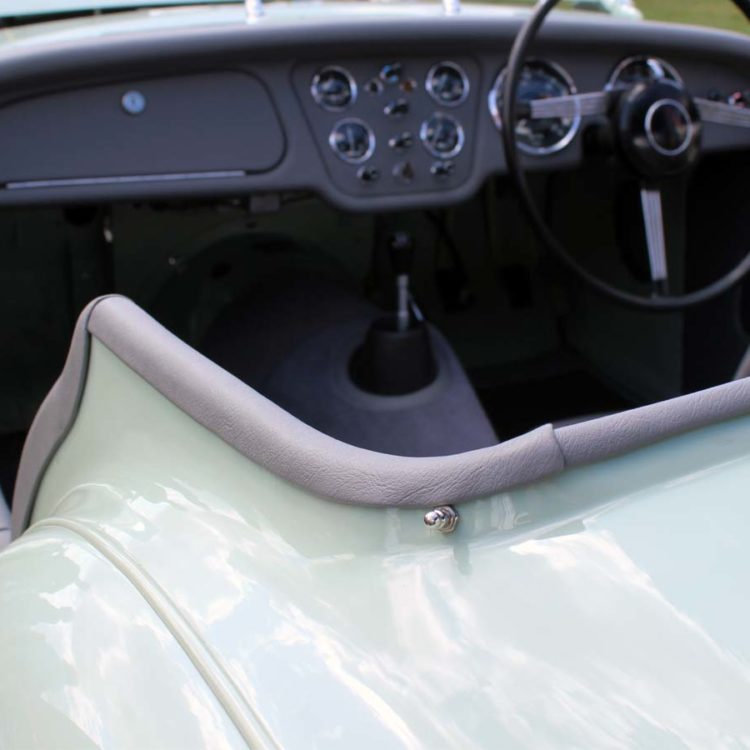 Triumph TR2 fitted with Saville Grey Vinyl Dashboard Facia Panel, and Vinyl Tonneau Cappings.