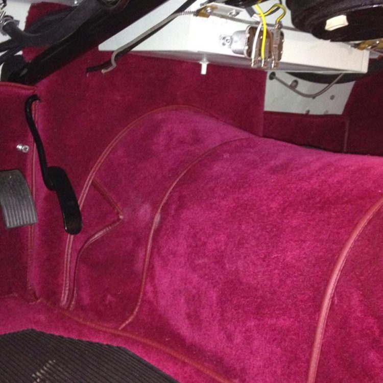 Triumph TR2 fitted with a Maroon Wool Carpets – Clutch Housing Gearbox Cover.