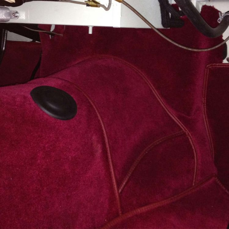 Triumph TR2 fitted with a Maroon Wool Carpets – Clutch Housing Gearbox Cover.