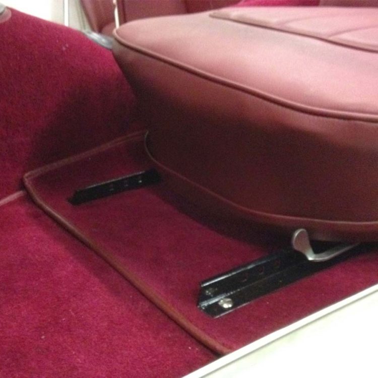 Triumph TR2 fitted with Maroon Vinyl Seat Covers and Wool Carpets.