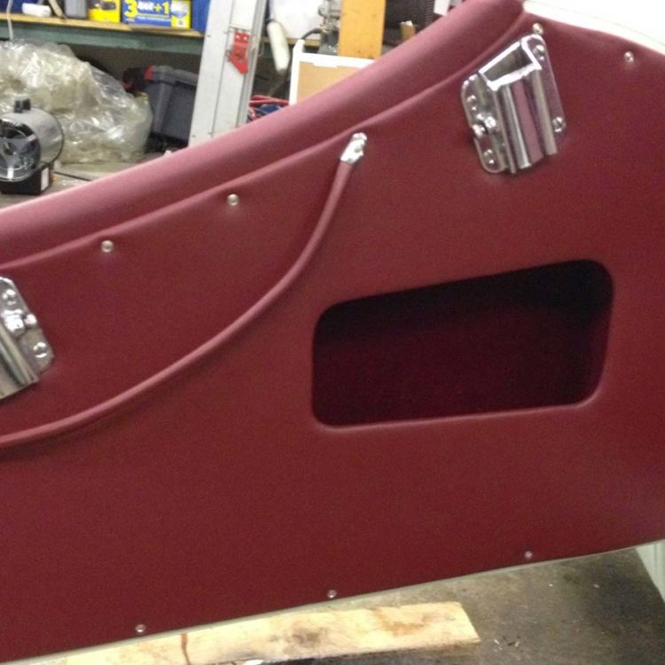 Triumph TR2 fitted with a Maroon Vinyl Door Panels, and Door Pulls Lanyards.