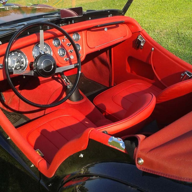 Triumph TR2 fitted with Bright Red Leatherfaced Seats, Leather Cappings, and Wool Carpets.
