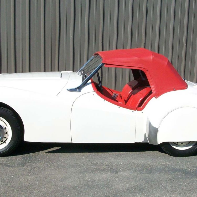 Triumph TR2 "TS01" fitted with Bright Red Wool Carpets supplied by JSM.