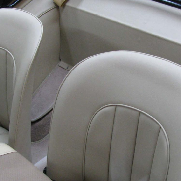 Triumph TR2 fitted with Light Stone Beige LeatherFaced Front Seats, and Vinyl Bulkhead Panel.