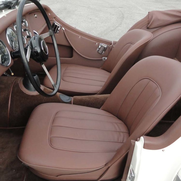 Triumph TR2 fitted with a Dark Brown LeatherFaced Seat Covers, Leather Cappings, Vinyl Interior Panels and Wool Carpets.