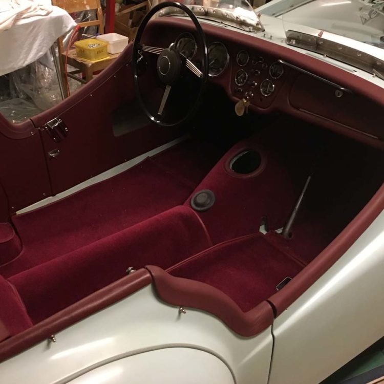 Triumph TR2 fitted with Maroon Vinyl Interior Trim Panels, Leather Cappings and Wool Carpets.