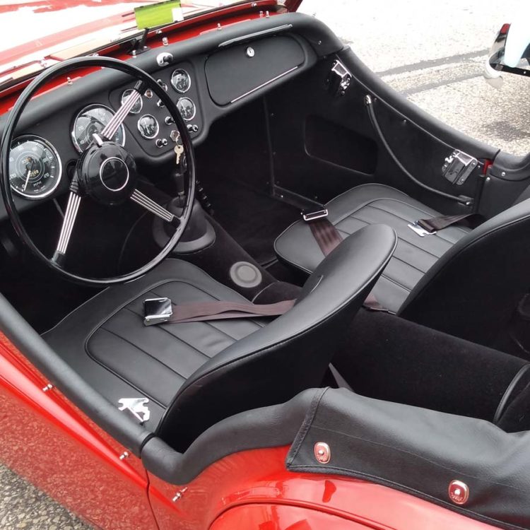 Triumph TR2 fitted with Black LeatherFaced Seats, Leather Cappings, Wool Carpets and Vinyl Hood Frame Cover.