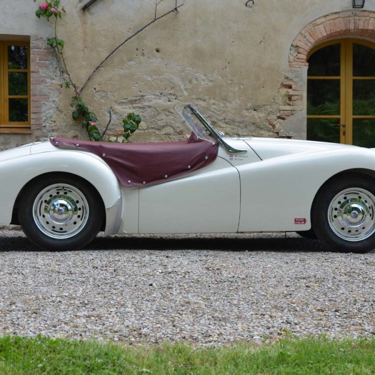 Triumph TR2 fitted with a Maroon PVC Everflex Tonneau Cover.