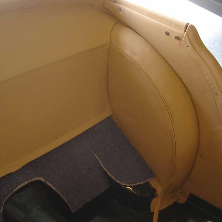 Triumph TR2 fitted with Biscuit Light Tan Leather Rear Bulkhead Panel, B Post Quarter Panels and Wheelarch Covers.