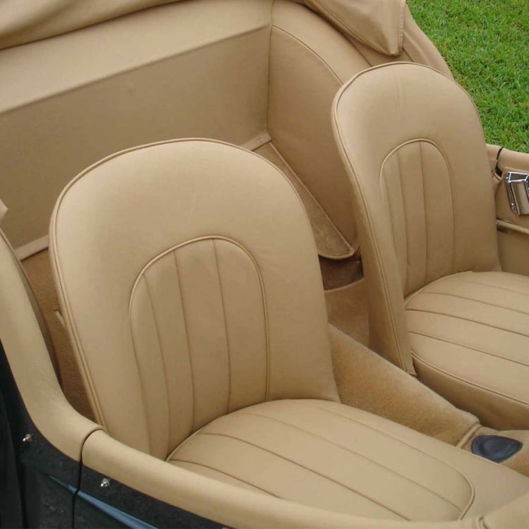 Triumph TR2 fitted with Biscuit Light Tan Leather Front Seat Covers, Interior Panels and Cappings, and Hood Frame Cover