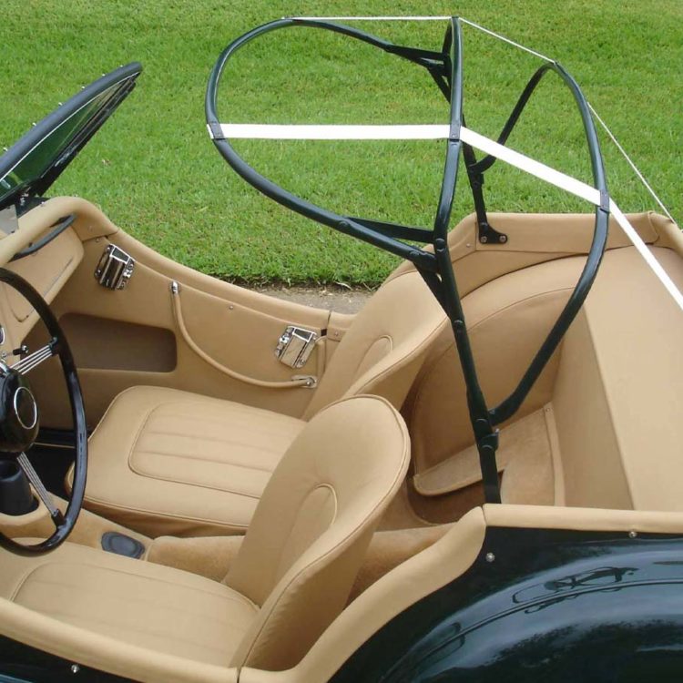 Triumph TR2 fitted with Biscuit Light Tan Leather Interior Panels, Front Seat Covers, & Beige Hood Webbing.