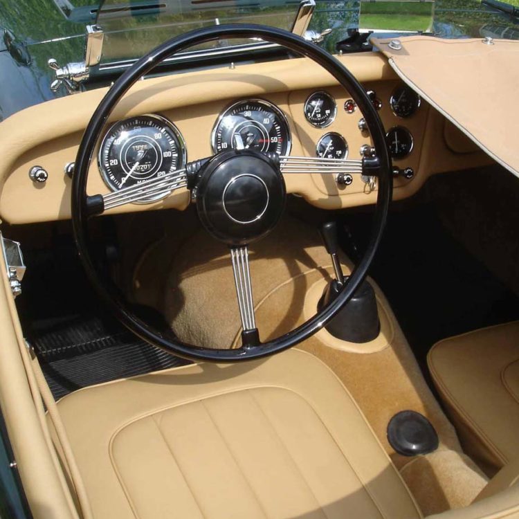 Triumph TR2 fitted with Biscuit Light Tan Leather Cappings & Dash Facia, Front Seat Covers, Palomino Wool and Sand PVC Everflex Tonneau.