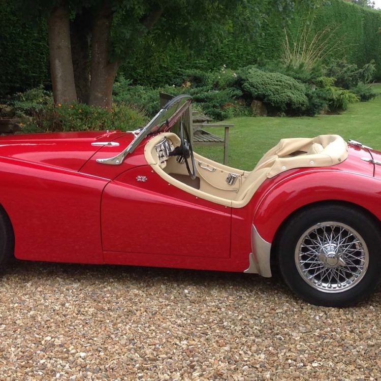 Triumph TR3 fitted with Magnolia LeatherFaced Front + Rear Seat Covers, Leather Cappings; with Vinyl Trim Panels and Hood Frame Cover.