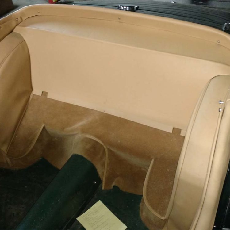 Triumph TR3 fitted with a Biscuit Light Tan Vinyl Rear Bulkhead Panel, Wheelarch Covers, Quarter Panels and Tonneau Cappings.