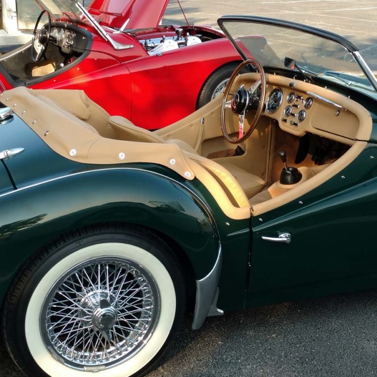 Triumph TR3 fitted with a Biscuit Light Tan Vinyl Hood Frame Cover and Interior Trim Panels; Leather Cappings and Palomino Wool Carpets.