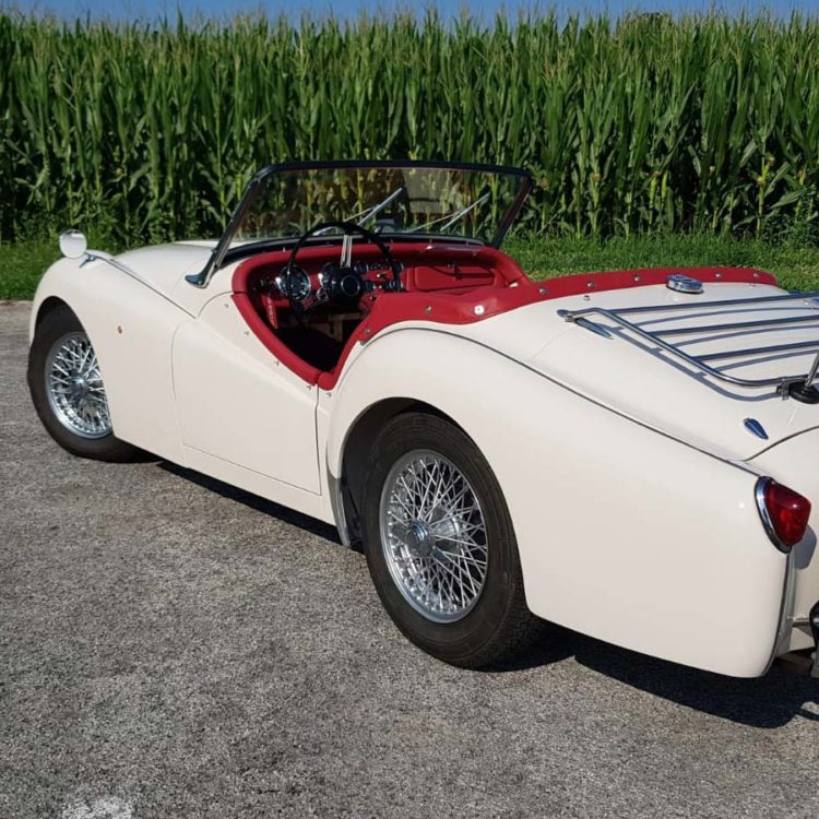Triumph TR3 fitted with a Cherry Red Vinyl Hood Frame Envelope, and Dashboard Facia, with Leather Capping Covers.
