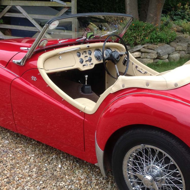 Triumph TR3 fitted with Magnolia Leather Cappings; Vinyl Trim Panels and Hood Frame Cover, and Dark Brown Wool Carpets.